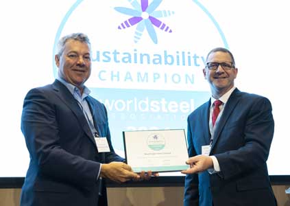 Mark Vasssella, BlueScope MD and CEO accepting the award from Leon Topalian, Worldsteel Chair and President & CEO